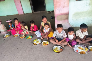 Children sharing an Annadanam meal